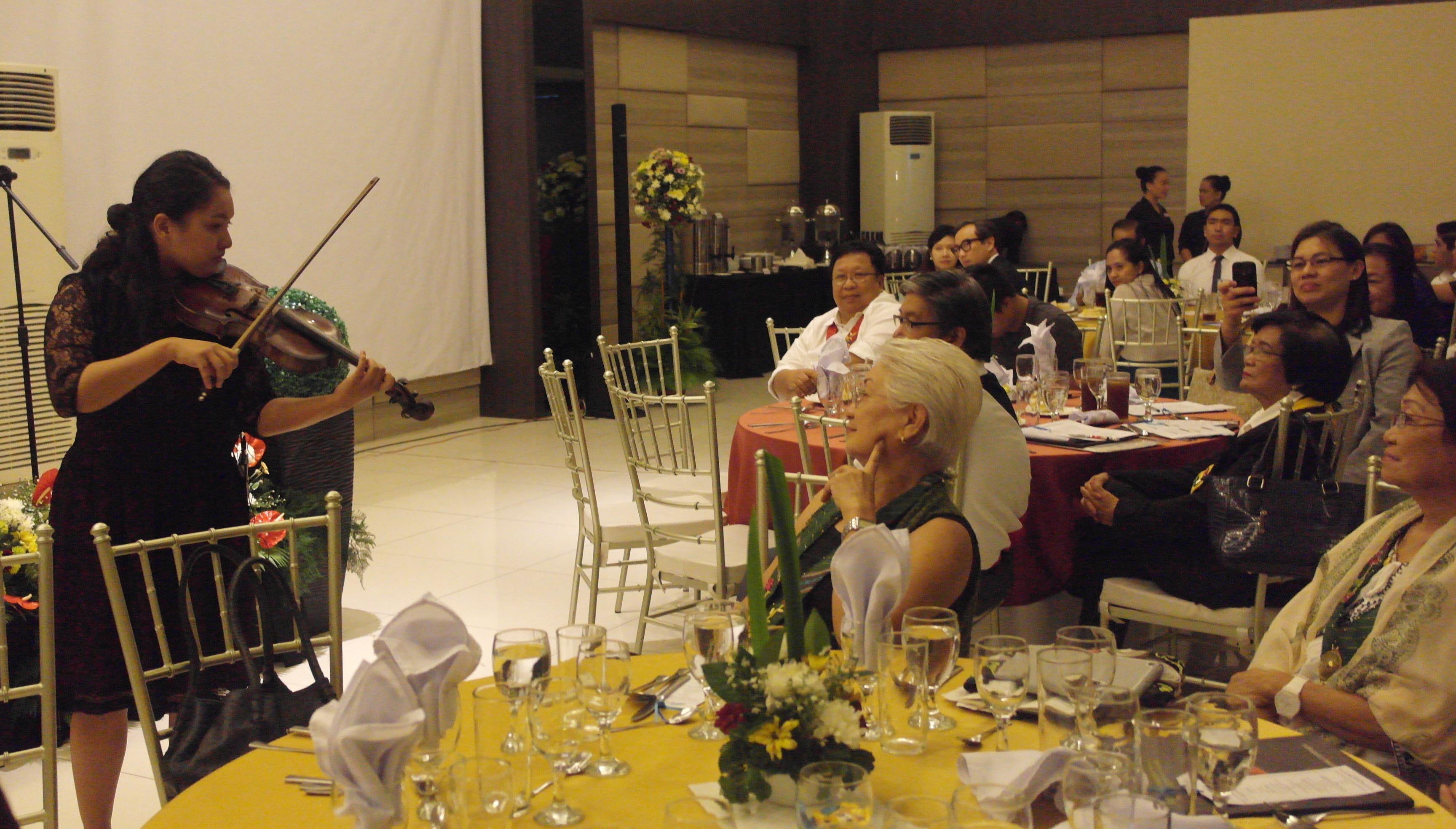 Outgoing members of the FPE Board of Trustees were serenaded by violinist Alyana Candice Czarina Altamirano